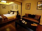 фото отеля Taiji Yangsheng Xiangheyuan Inn