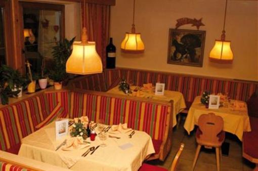 фото отеля Achenseer Huttendorfl Chalets Maurach