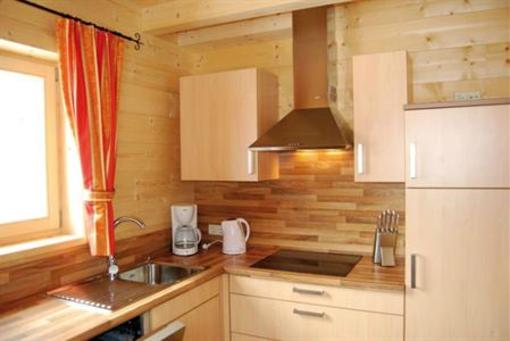 фото отеля Achenseer Huttendorfl Chalets Maurach