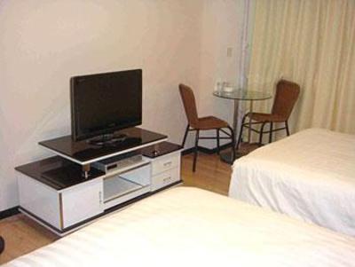 фото отеля Sixiangjia Chain Serviced Apartment Shenzhen Kaite