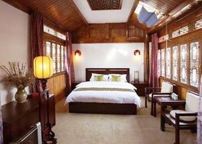 фото отеля Bashilai Inn Lijiang Bayi