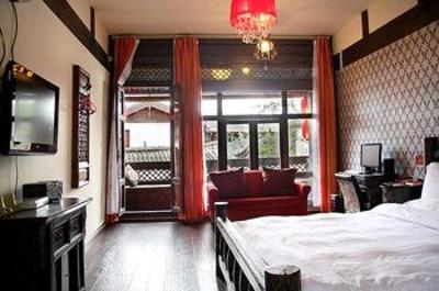 фото отеля Bashilai Inn Lijiang Bayi