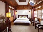 фото отеля Bashilai Inn Lijiang Bayi