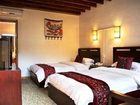 фото отеля Bashilai Inn Lijiang Bayi