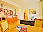 фото отеля Central Capital Apartments - Haris