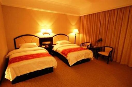 фото отеля Wu Long Business Hotel Zhangjiajie