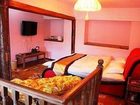 фото отеля Zai Shui Yi Fang Inn Lijiang