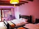 фото отеля Zai Shui Yi Fang Inn Lijiang