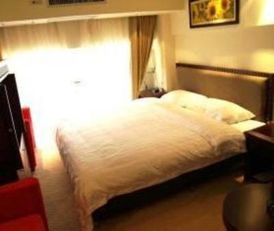 фото отеля Xiamen Mode Inn Guandi Branch