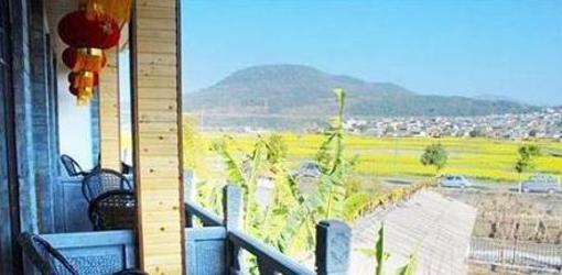 фото отеля Wu Family Courtyard Mongolian Style Inn Tengchong