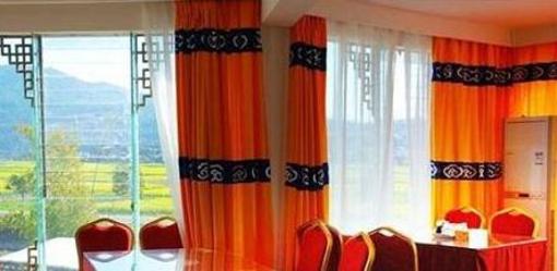 фото отеля Wu Family Courtyard Mongolian Style Inn Tengchong