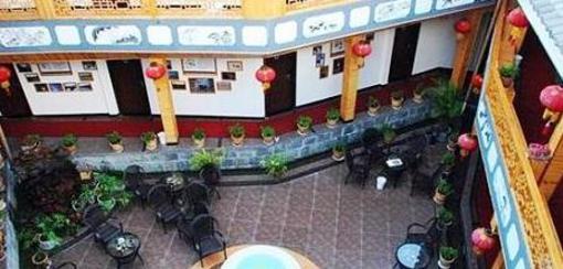 фото отеля Wu Family Courtyard Mongolian Style Inn Tengchong