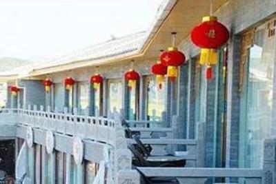 фото отеля Wu Family Courtyard Mongolian Style Inn Tengchong
