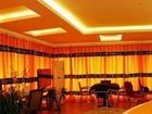 фото отеля Wu Family Courtyard Mongolian Style Inn Tengchong