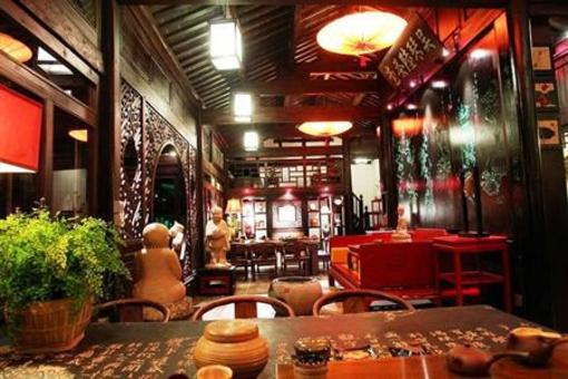 фото отеля Lijiang Zheng Fu Cao Tang Inn Shu Xiang Mansion