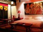 фото отеля Lijiang Zheng Fu Cao Tang Inn Shu Xiang Mansion