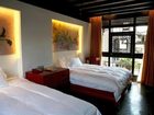фото отеля Lijiang Zheng Fu Cao Tang Inn Shu Xiang Mansion