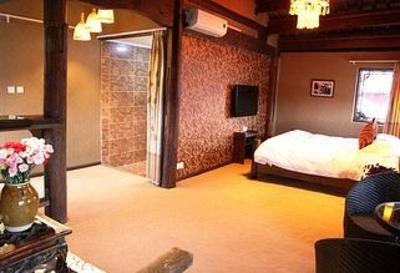 фото отеля Sunshine Lijiang Inn