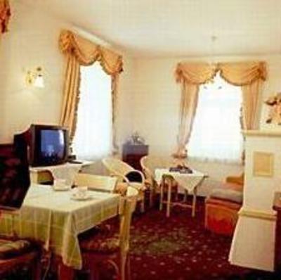 фото отеля Aparthotel Grattschlossl St. Johann in Tirol