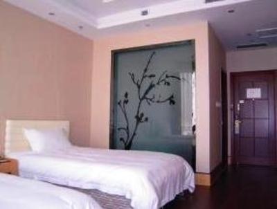 фото отеля Green Tree Inn Qianan Fortune Center Hotel