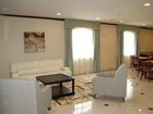 фото отеля Grand Inn & Suites