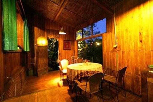 фото отеля The Riverside Javanese Cottages
