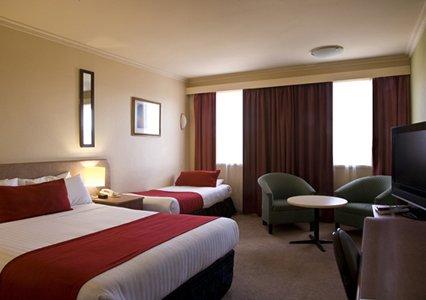 фото отеля Comfort Inn Coach House