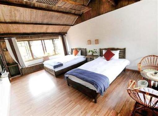 фото отеля Lijiang Lazy Inn