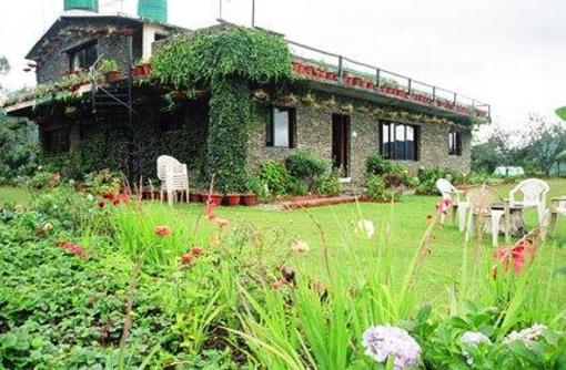 фото отеля Corbett Riverside Resort Ramnagar