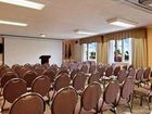 фото отеля Royal Coachman Inn & Suites