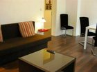 фото отеля Berlin Holiday Apartments