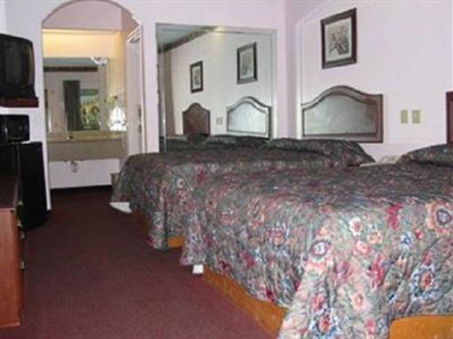 фото отеля Scottish Inn & Suites Houston - Eastex Freeway