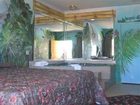 фото отеля Scottish Inn & Suites Houston - Eastex Freeway