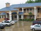 фото отеля Scottish Inn & Suites Houston - Eastex Freeway