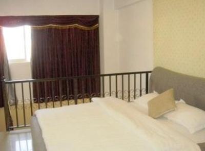 фото отеля Yiya Sunshine Apartment Hotel