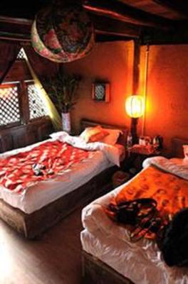 фото отеля Jiayou Shaquan Inn