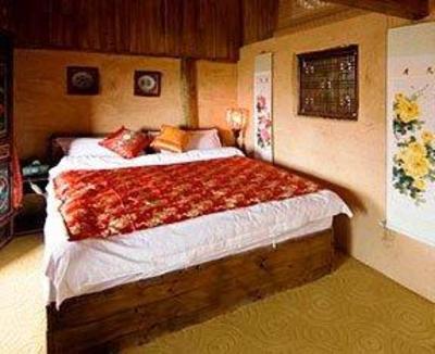 фото отеля Jiayou Shaquan Inn