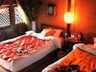 фото отеля Jiayou Shaquan Inn
