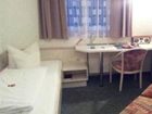 фото отеля Hotel Poppular Wuzburg