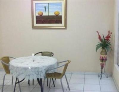 фото отеля Hostal Casa Suiza