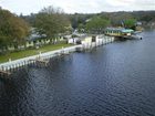 фото отеля Port of Call Yacht Club at Astor Bridge Marina & Hotel