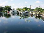 фото отеля Port of Call Yacht Club at Astor Bridge Marina & Hotel