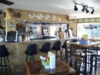 фото отеля Port of Call Yacht Club at Astor Bridge Marina & Hotel