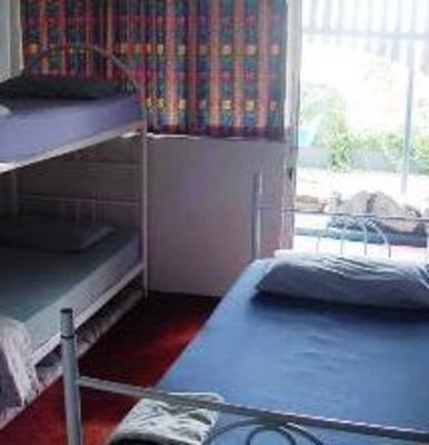 фото отеля Bluetongue Backpackers & Tours