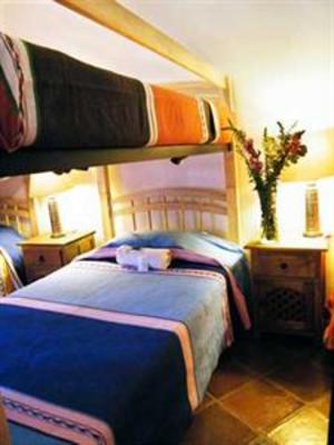 фото отеля Al Son de los Santos . Hostal Artesanal