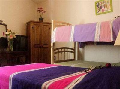 фото отеля Al Son de los Santos . Hostal Artesanal