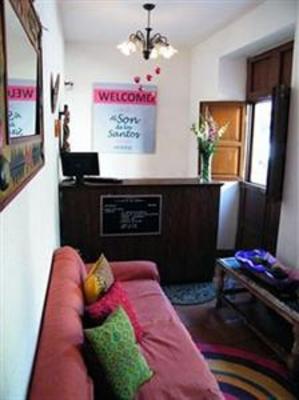 фото отеля Al Son de los Santos . Hostal Artesanal