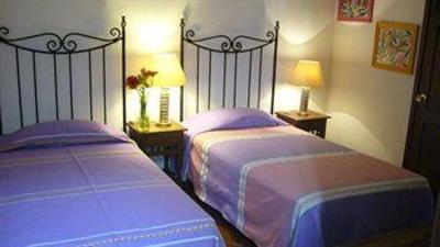 фото отеля Al Son de los Santos . Hostal Artesanal
