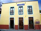 фото отеля Al Son de los Santos . Hostal Artesanal