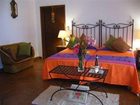 фото отеля Al Son de los Santos . Hostal Artesanal